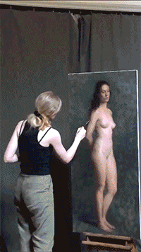 Instructor Isabella Watling painting figure.